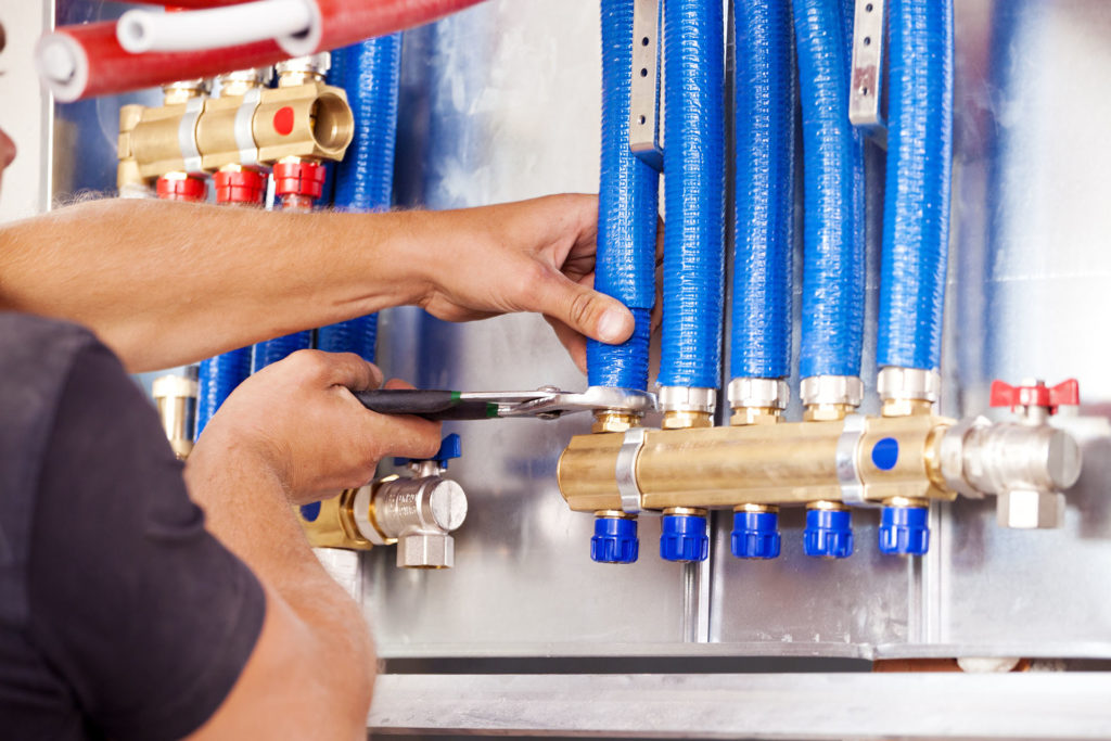 Plumber mounted distributor of central heating Heizungsbauer
